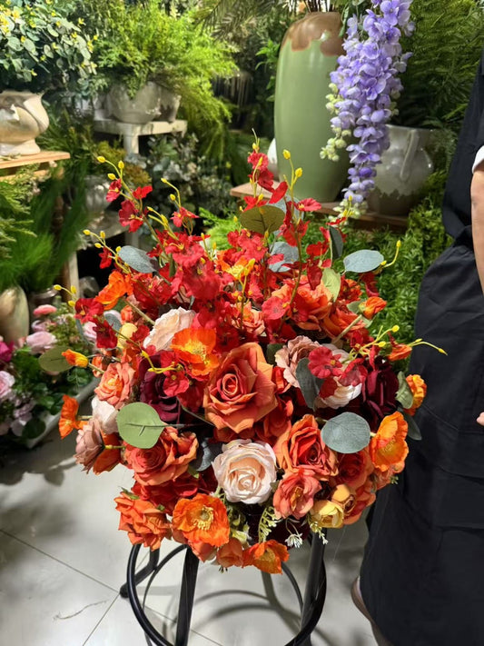 Location de fleurs orange pour centre de table