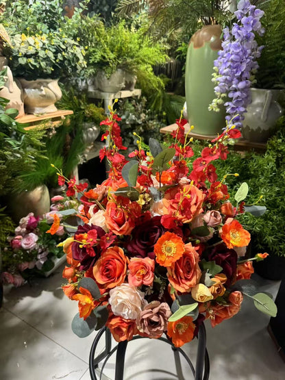 Location de fleurs orange pour centre de table